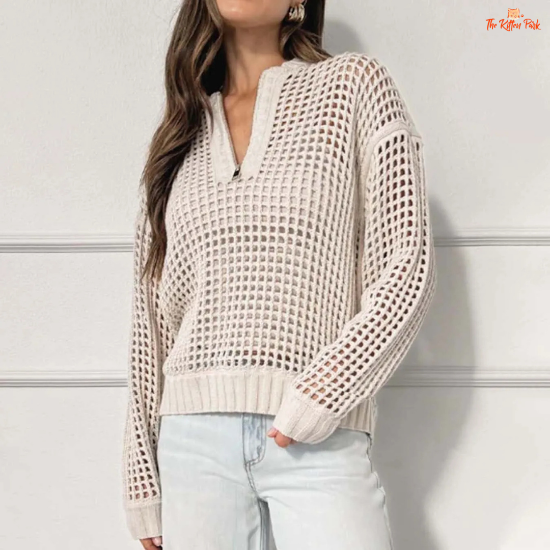 Beige V-neck hollow-out knit sweater with zipper front, loose fit and stylish streetwear design for women.