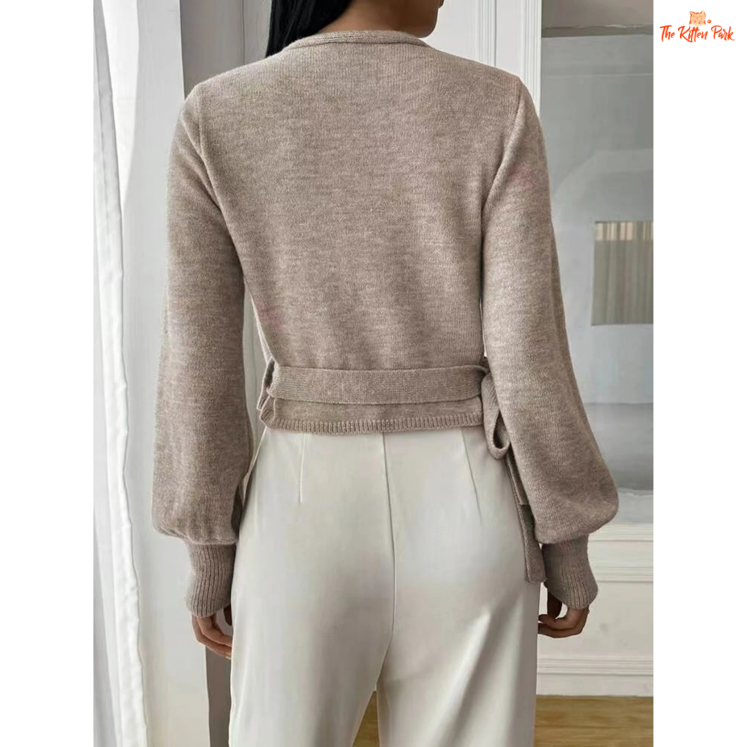 Women’s V-neck lace-up knitted cardigan sweater featuring a short fit, open stitch design, and khaki knit fabric for cozy autumn-winter wear.