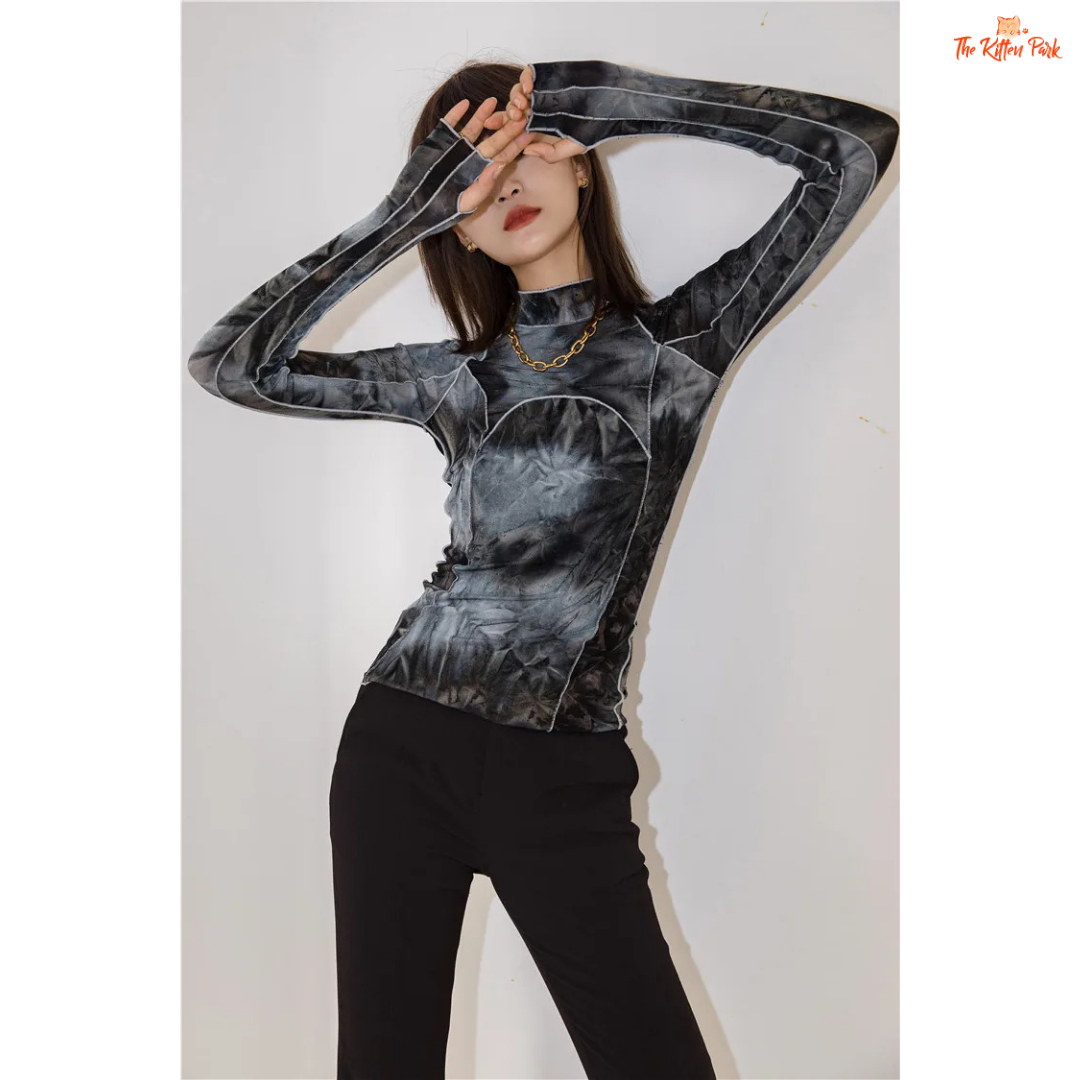 Grey tie-dye turtleneck with a slim fit and gradient pattern, ideal for fall fashion with a body-hugging silhouette and full sleeves.