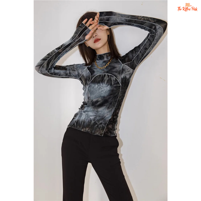Grey tie-dye turtleneck with a slim fit and gradient pattern, ideal for fall fashion with a body-hugging silhouette and full sleeves.