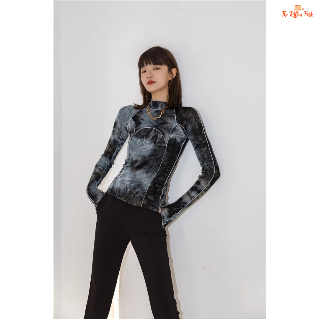 Grey tie-dye turtleneck with a slim fit and gradient pattern, ideal for fall fashion with a body-hugging silhouette and full sleeves.