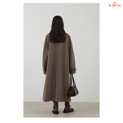 Women's long camel wool-blend overcoat with single-breasted front, stand collar, drop-shoulder sleeves, wide-waisted fit, and button details for autumn/winter.