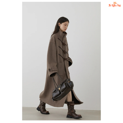 Women's long camel wool-blend overcoat with single-breasted front, stand collar, drop-shoulder sleeves, wide-waisted fit, and button details for autumn/winter.