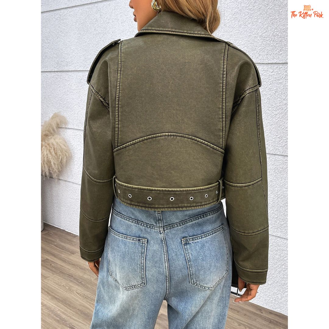 A women’s cropped faux leather motorcycle jacket with zip closure, drop-shoulder sleeves, and moto-inspired biker style.