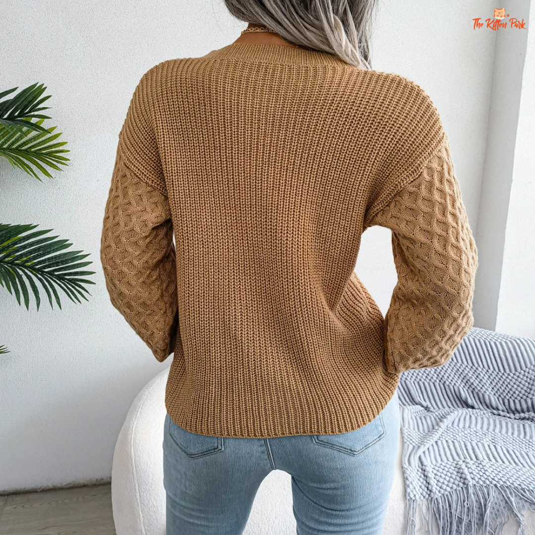 Women Lantern Sleeve Knit Pullover Sweater Autumn Winter made of heavyweight acrylic, with loose fit, O-neck, and full-length lantern sleeves.