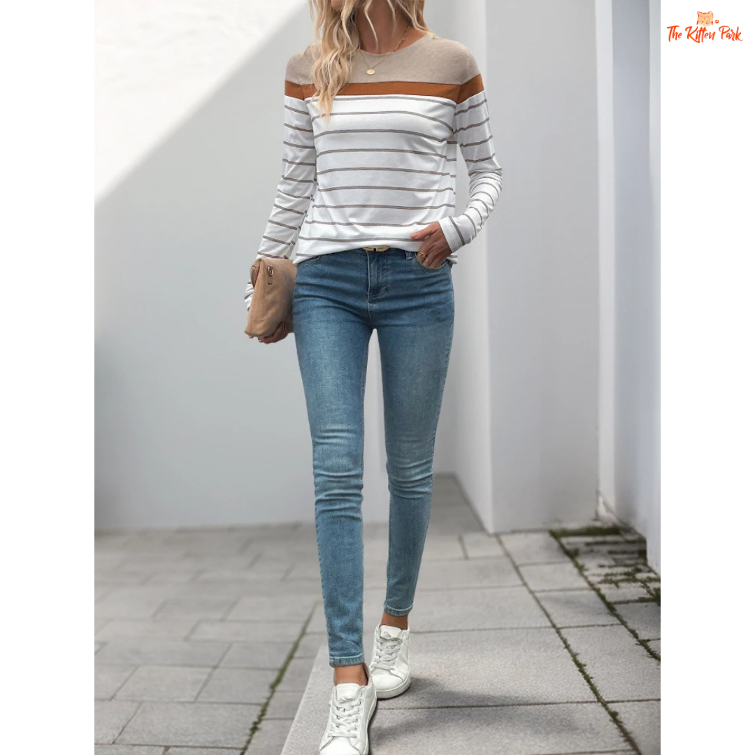 A women’s 3D stripe color block T-shirt with long sleeves, O-neck, and a loose casual fit for spring and autumn wear.