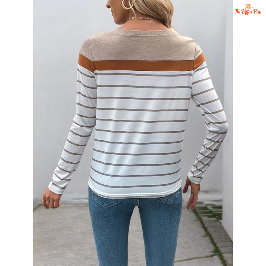 A women’s 3D stripe color block T-shirt with long sleeves, O-neck, and a loose casual fit for spring and autumn wear.