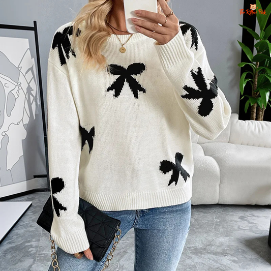 Women’s Bow Jacquard Knit Sweater – Autumn Winter 2026, a loose-fit acrylic pullover with bow jacquard decoration, O-neck and full-length sleeves, ideal for autumn and winter layering.