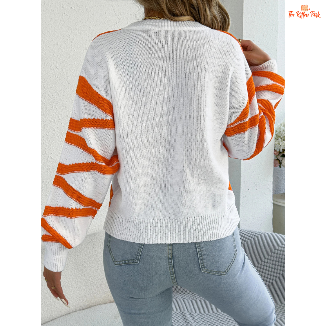 A women’s heavyweight acrylic striped knit sweater with lantern sleeves, O-neck collar, and regular fit, designed for autumn and winter wear.