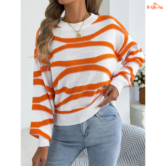 A women’s heavyweight acrylic striped knit sweater with lantern sleeves, O-neck collar, and regular fit, designed for autumn and winter wear.
