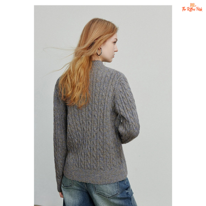 Women's knitted solid pullover with high zipper collar, full sleeves, and regular fit, suitable for autumn and winter office or casual wear.
