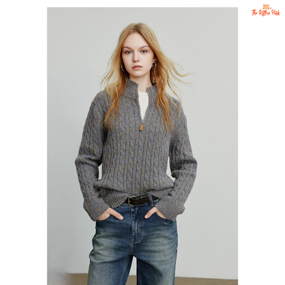 Women's knitted solid pullover with high zipper collar, full sleeves, and regular fit, suitable for autumn and winter office or casual wear.
