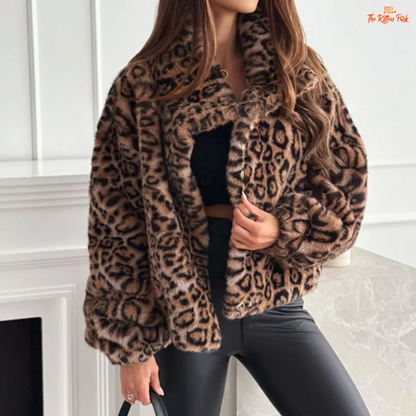 Women's Leopard Print Coat, casual loose-fit winter jacket with bold leopard pattern, thick fabric, and single-breasted closure for autumn and winter.