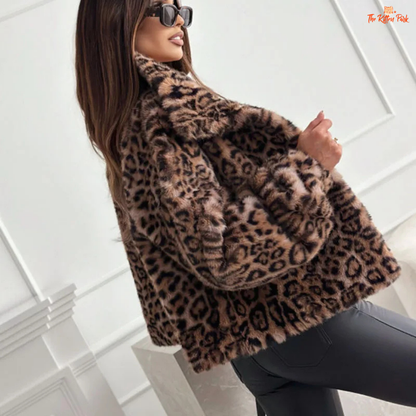 Women's Leopard Print Coat, casual loose-fit winter jacket with bold leopard pattern, thick fabric, and single-breasted closure for autumn and winter.