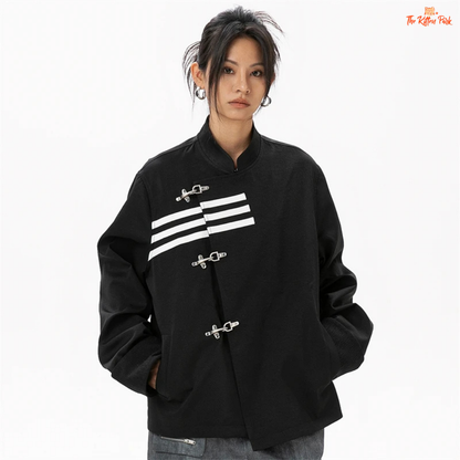 Person wearing a black jacket with white accents on a white background