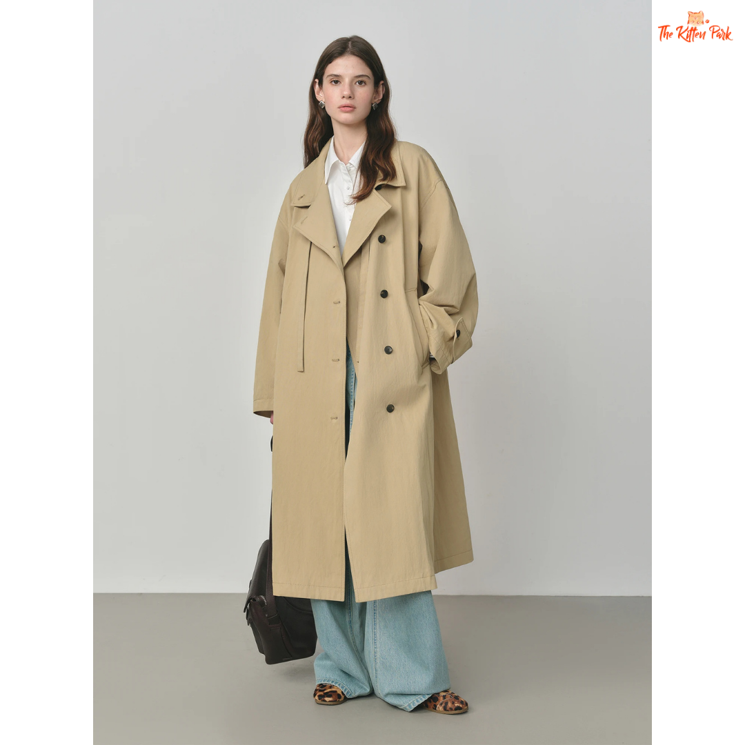 Women’s Oversized Casual Trench Coat 2026 with long length, lace-up decoration, turndown collar, and wide-waisted fit in pink-beige gradient style.