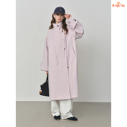 Women’s Oversized Casual Trench Coat 2026 with long length, lace-up decoration, turndown collar, and wide-waisted fit in pink-beige gradient style.