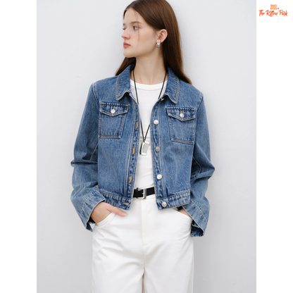 Women’s retro short denim jacket in blue cotton with turn-down collar, single-breasted closure, and buttons, styled for casual spring and summer outfits.
