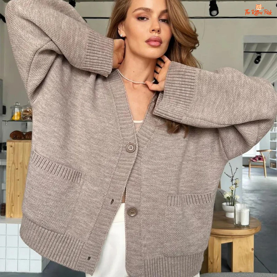 Women’s Solid V-Neck Cardigan – Loose Knit Single-Breasted Sweater with Pockets, extra-heavy fabric, casual loose fit, and full-length sleeves.