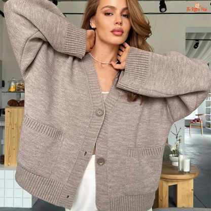 Women’s Solid V-Neck Cardigan – Loose Knit Single-Breasted Sweater with Pockets, extra-heavy fabric, casual loose fit, and full-length sleeves.