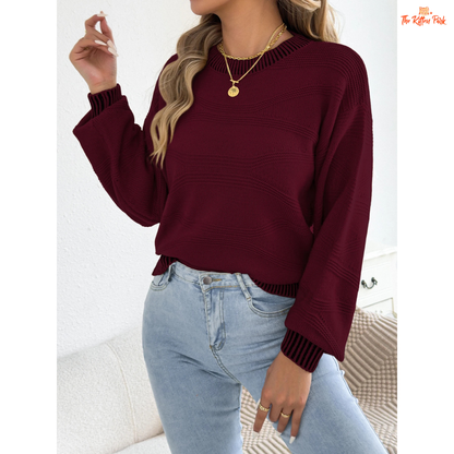 A women’s heavyweight acrylic striped knit sweater with lantern sleeves, O-neck, and regular fit, designed for casual autumn and winter wear.
