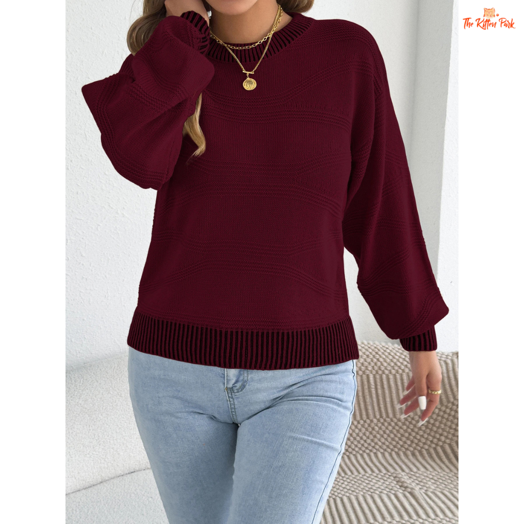 A women’s heavyweight acrylic striped knit sweater with lantern sleeves, O-neck, and regular fit, designed for casual autumn and winter wear.