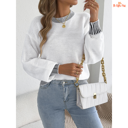 A women’s heavyweight acrylic striped knit sweater with lantern sleeves, O-neck, and regular fit, designed for casual autumn and winter wear.