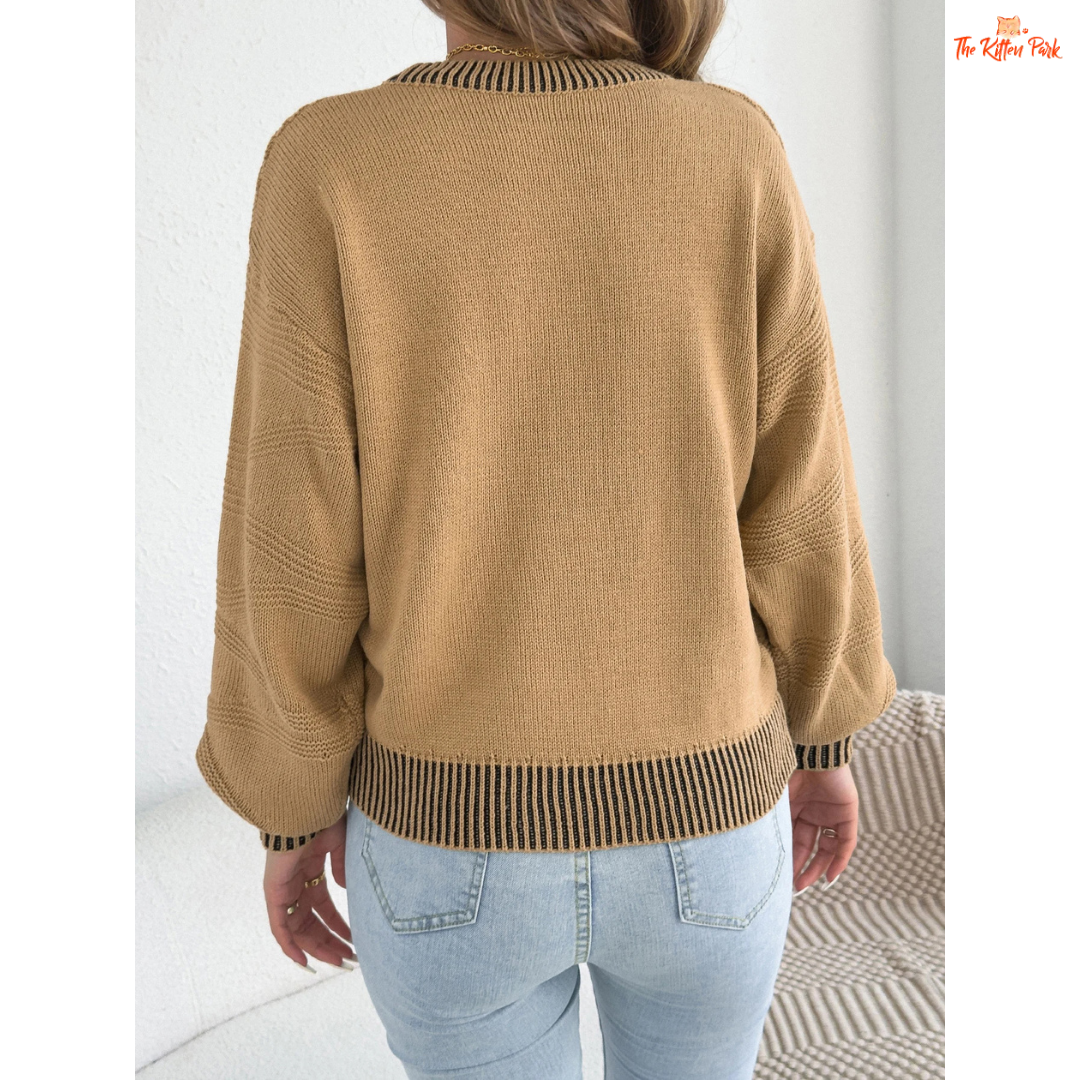 A women’s heavyweight acrylic striped knit sweater with lantern sleeves, O-neck, and regular fit, designed for casual autumn and winter wear.