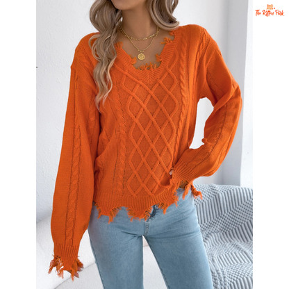 A women’s heavyweight acrylic V-neck sweater with ripped tassel detailing, full sleeves, and a regular fit, designed for casual autumn and winter outfits.