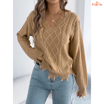 A women’s heavyweight acrylic V-neck sweater with ripped tassel detailing, full sleeves, and a regular fit, designed for casual autumn and winter outfits.