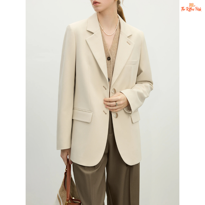 Elegant women’s versatile blazer in light green and off-white tones, featuring a loose fit, single-breasted closure, and notched collar for spring and summer office wear.