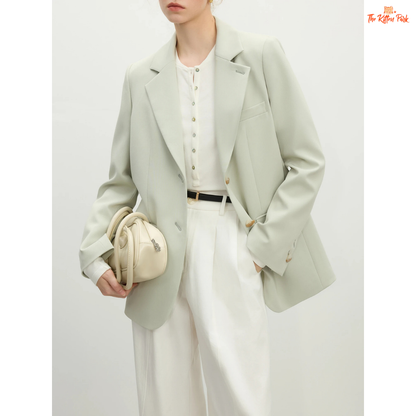 Elegant women’s versatile blazer in light green and off-white tones, featuring a loose fit, single-breasted closure, and notched collar for spring and summer office wear.