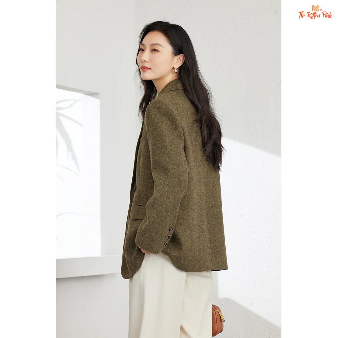 Women’s amber green wool blend blazer with single-breasted closure, turn-down collar, and pockets, designed for autumn and winter office style.