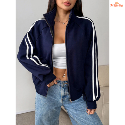 A light navy blue women's zipper sports coat with pockets, striped knit pattern, turtleneck collar, and warm fur liner for autumn streetwear looks.