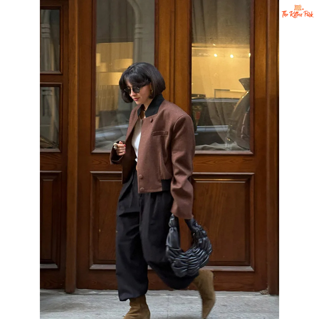 Coffee brown women's vintage lapel short jacket with full sleeves, pockets, and turtleneck collar for casual autumn wear.