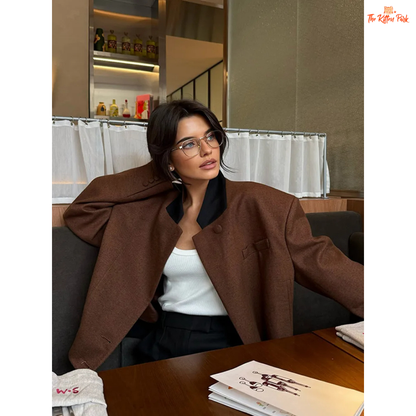 Coffee brown women's vintage lapel short jacket with full sleeves, pockets, and turtleneck collar for casual autumn wear.