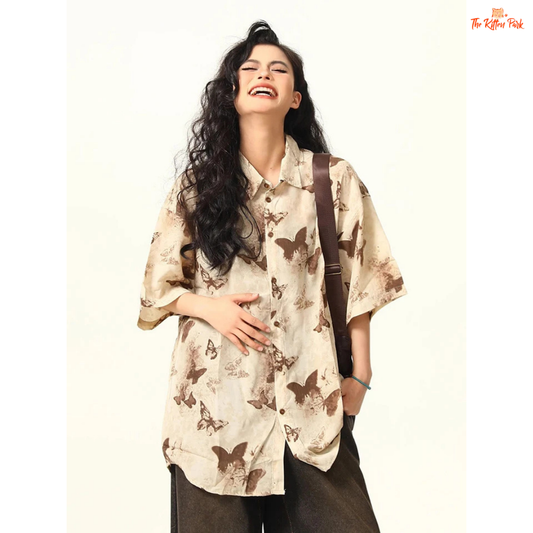 Oversized Y2K butterfly print shirt with turn-down collar, short sleeves, and single-breasted front — a lightweight streetwear blouse in Harajuku style.