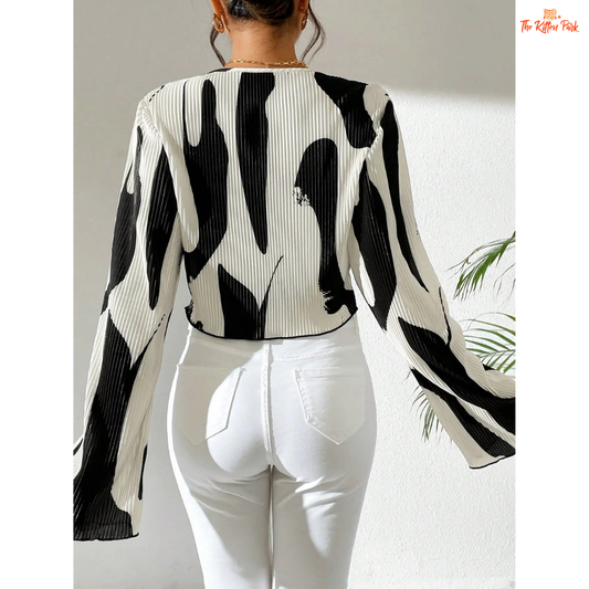 Printed pleated blouse for women with flared long sleeves and round neck, designed for spring and summer casual wear.