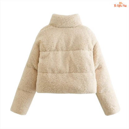 A short winter puffer coat for women with lamb wool texture, stand collar, bat sleeves, thick cotton filling, and casual zip-up style in solid color.