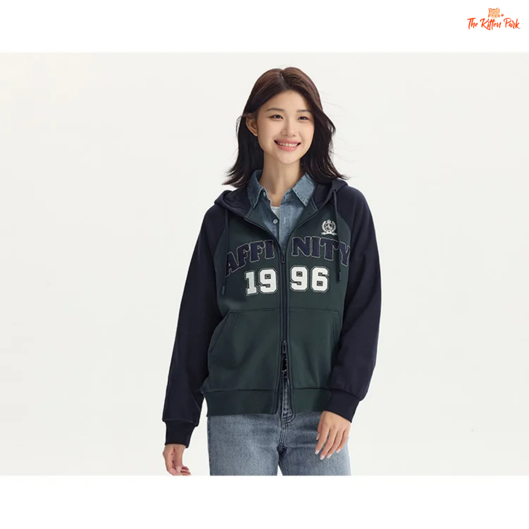 A women’s hooded embroidered jacket with a loose fit, color-block design, zipper closure, full sleeves, and casual autumn style.