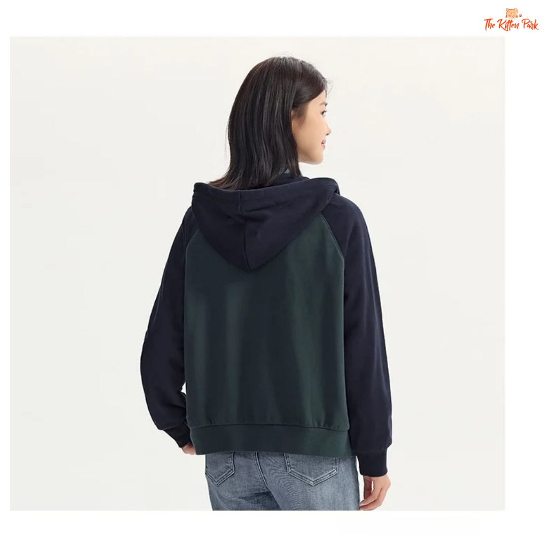 A women’s hooded embroidered jacket with a loose fit, color-block design, zipper closure, full sleeves, and casual autumn style.