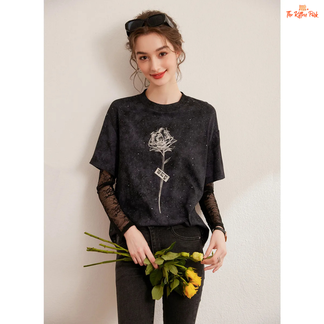 White floral loose-fit T-shirt for women with layered design, bright silk decoration, full sleeves, and a casual round neck – ideal for autumn and winter.