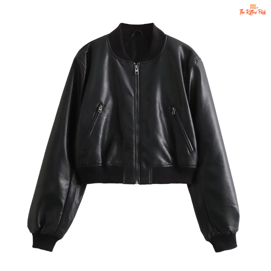 A sleek black PU leather jacket for women with a zippered front, round neck, and long sleeves, styled for modern streetwear fashion.