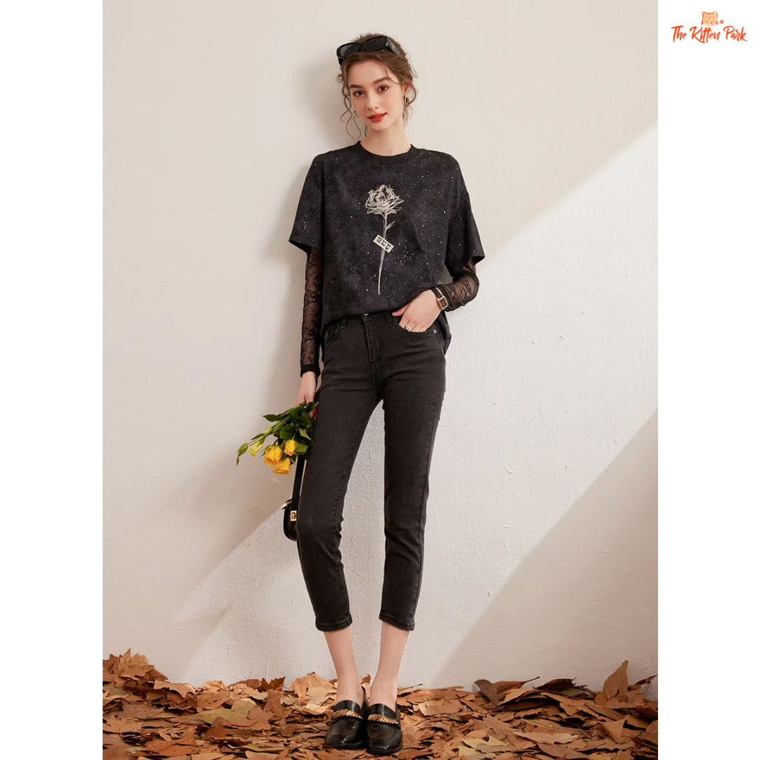 White floral loose-fit T-shirt for women with layered design, bright silk decoration, full sleeves, and a casual round neck – ideal for autumn and winter.