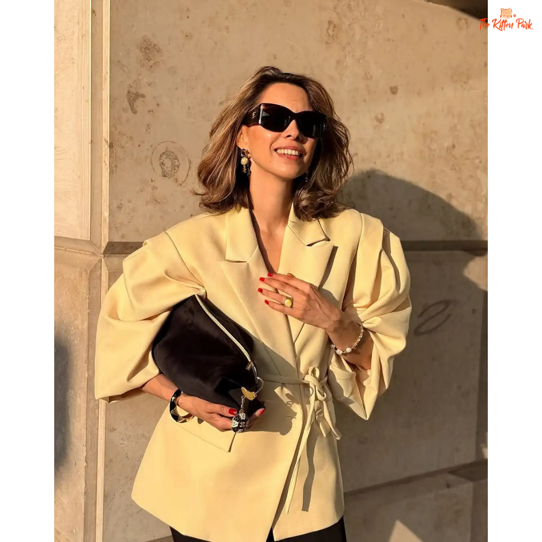 Women's lace-up waist blazer with chic V-neck lapel, single button closure, and full sleeves — perfect formal spring/summer outerwear in polyester.