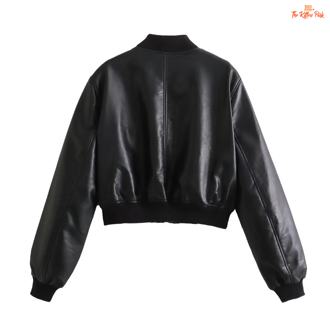 A sleek black PU leather jacket for women with a zippered front, round neck, and long sleeves, styled for modern streetwear fashion.