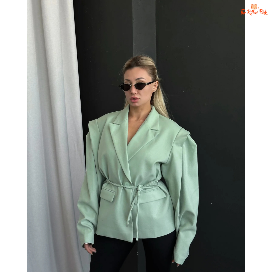Women's lace-up waist blazer with chic V-neck lapel, single button closure, and full sleeves — perfect formal spring/summer outerwear in polyester.
