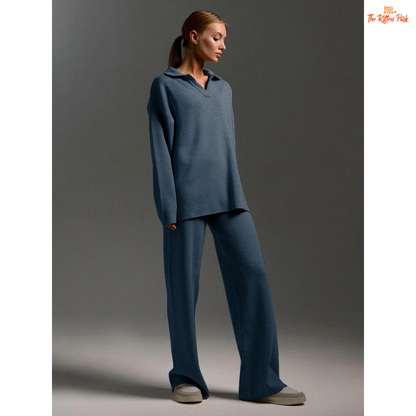 Woman wearing a blue outfit against a gray background