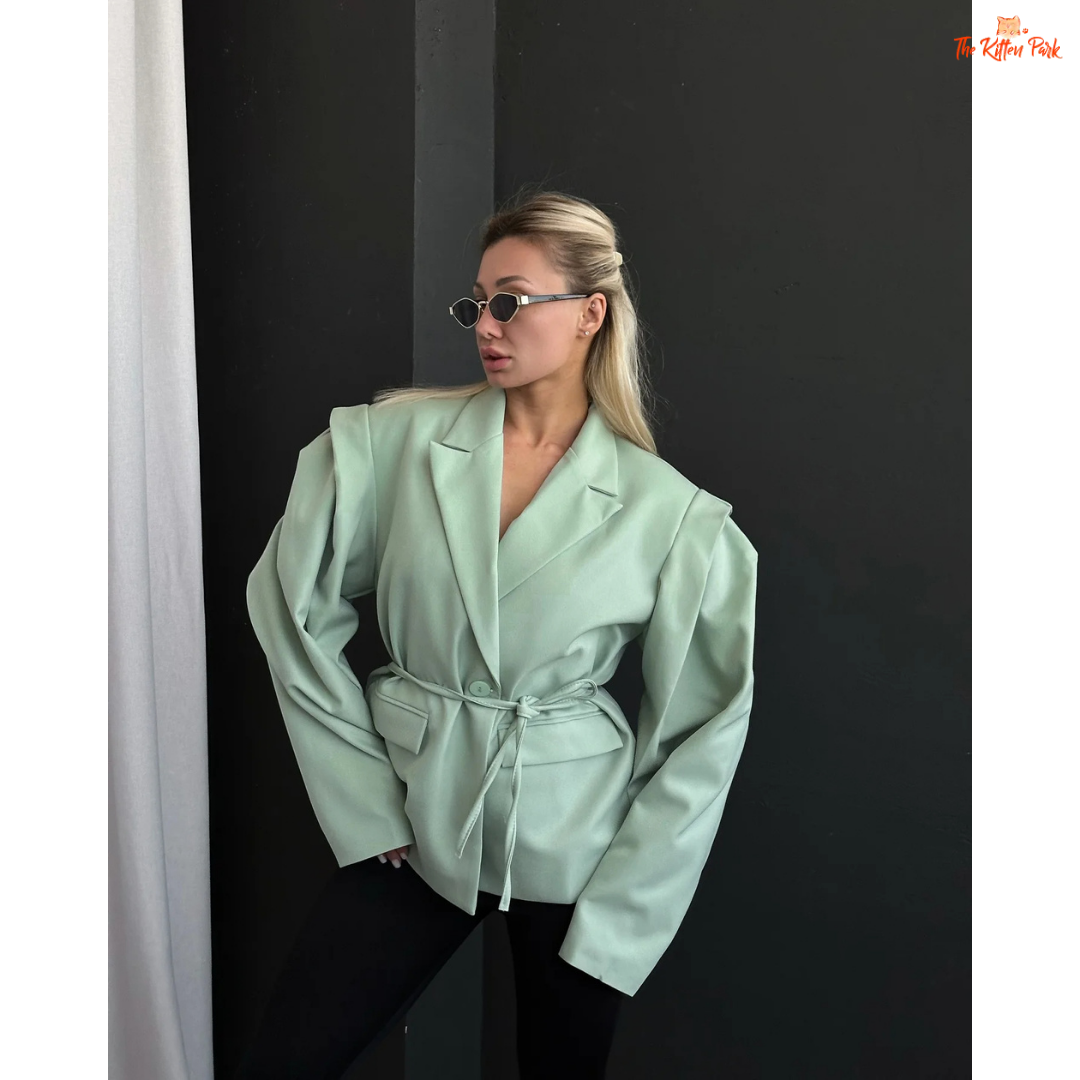 Women's lace-up waist blazer with chic V-neck lapel, single button closure, and full sleeves — perfect formal spring/summer outerwear in polyester.
