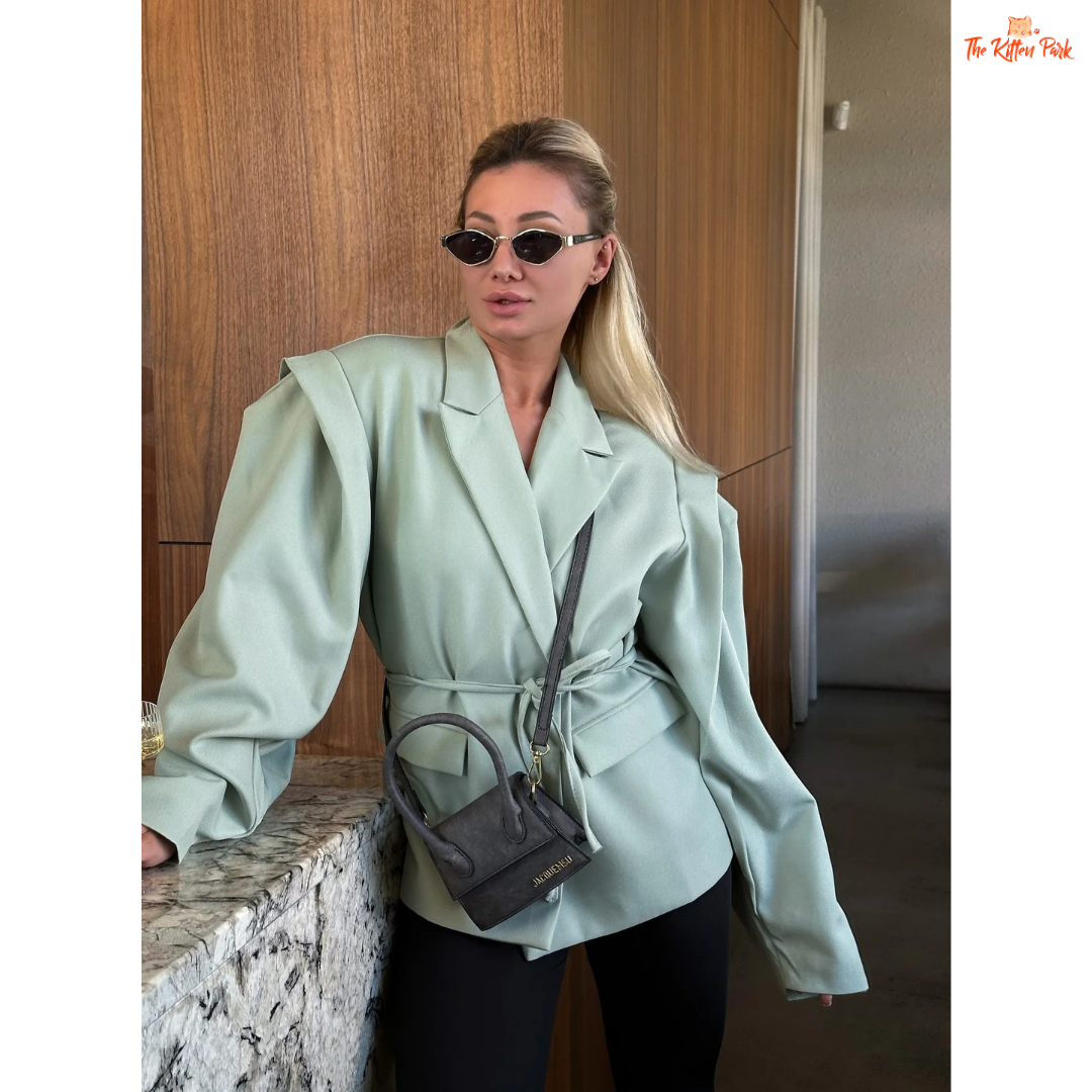 Women's lace-up waist blazer with chic V-neck lapel, single button closure, and full sleeves — perfect formal spring/summer outerwear in polyester.